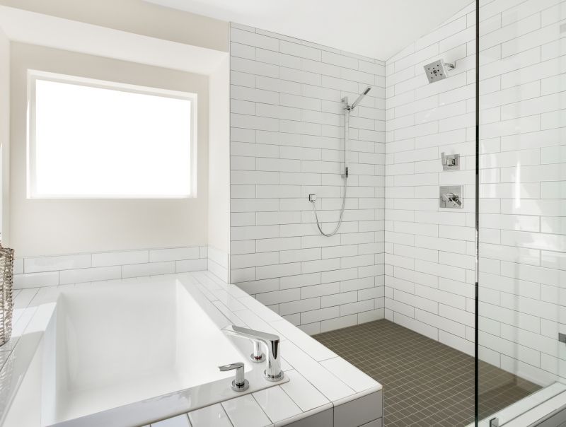 Large White Tiles in a Walk-in Shower